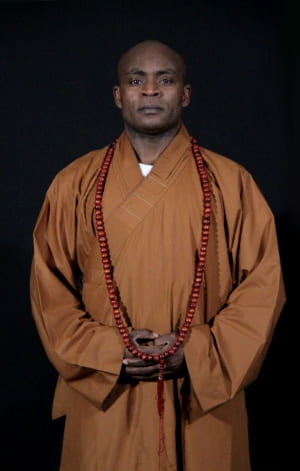 Photo of Master Dominique Saatenang in traditionnal outfit
